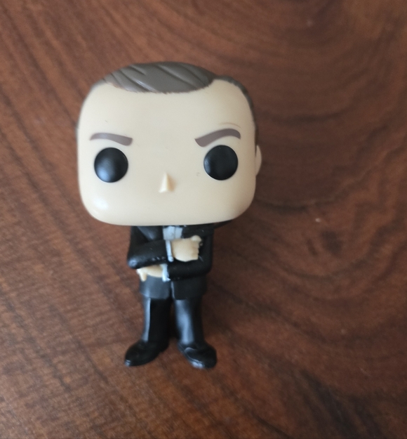 Funko Pop Figures with Black, Gray, and Cream Outfits From James Bond Movies - Picture 3 of 6